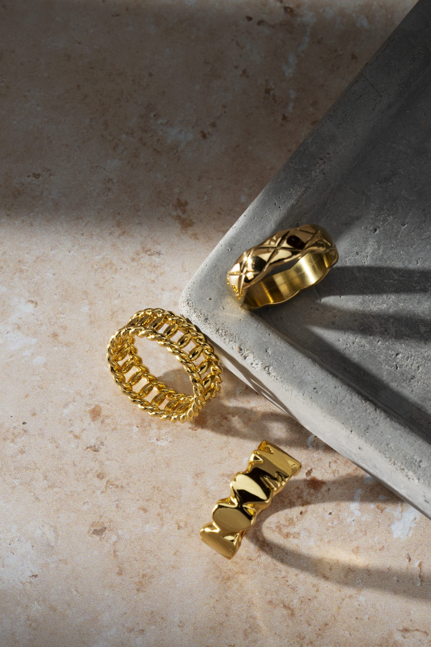 view-luxurious-golden-ring-rock-concrete-tray
